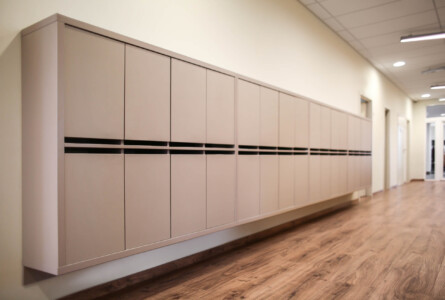 Lockers in empty school hallway
