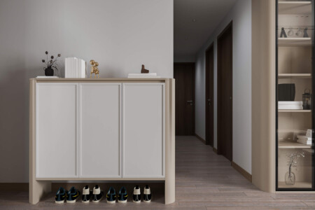 White and gray shoe rack standing by the entrance.